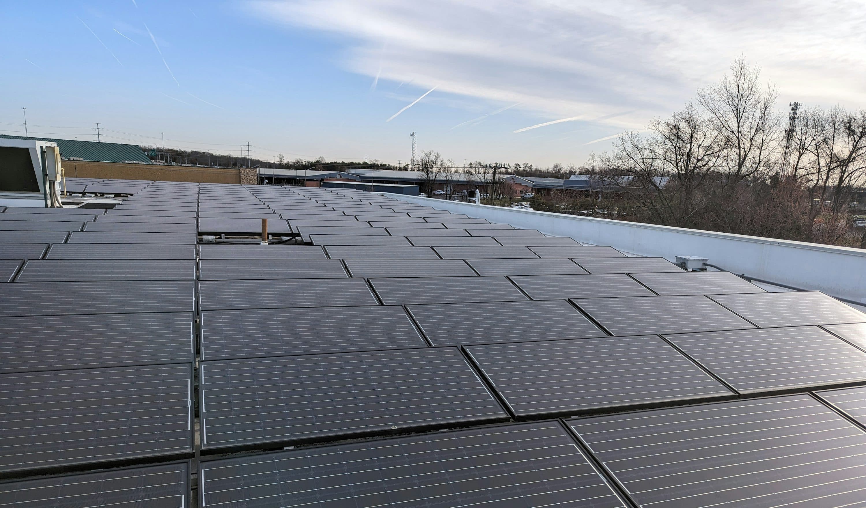 Solar panels being installed on a residential roof